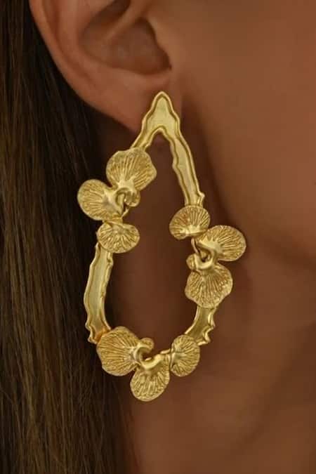 Shop Eurumme Gold Plated Dewdrop Floral Carved Earrings at Aza Fashions Shop_Eurumme_Gold Plated Dewdrop Floral Carved Earrings_at_Aza_Fashions