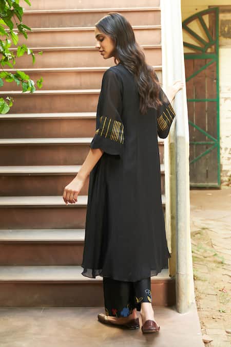 Shop_Vaayu_Black Muslin Tassels, Applique V-neck Linear Thread Work Kurta And Pant Set _at_Aza_Fashions