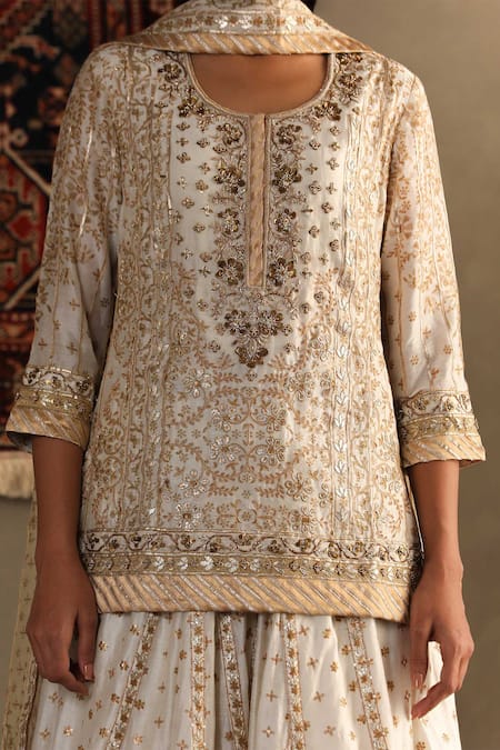 Buy RI.Ritu Kumar Off White Silk, Chanderi Gota Patti Round Neck Embroidered Kurti Sharara Set Online at Aza Fashions Buy_RI.Ritu Kumar_Off White Silk, Chanderi Gota Patti Round Neck Embroidered Kurti Sharara Set _Online_at_Aza_Fashions