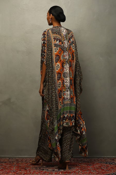 Shop RI.Ritu Kumar Black Viscose Mirrors, Embroidery Tribal Bloom Print Cape And Flared Pant Set at Aza Fashions Shop_RI.Ritu Kumar_Black Viscose Mirrors, Embroidery Tribal Bloom Print Cape And Flared Pant Set _at_Aza_Fashions