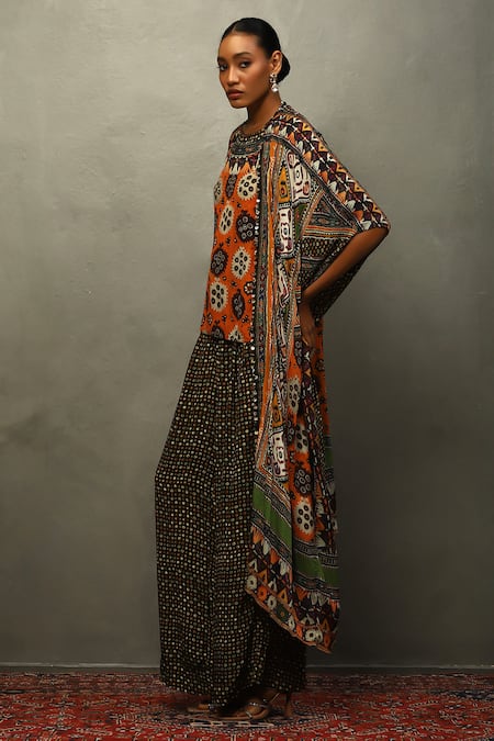 Buy RI.Ritu Kumar Black Viscose Mirrors, Embroidery Tribal Bloom Print Cape And Flared Pant Set Online at Aza Fashions Buy_RI.Ritu Kumar_Black Viscose Mirrors, Embroidery Tribal Bloom Print Cape And Flared Pant Set _Online_at_Aza_Fashions