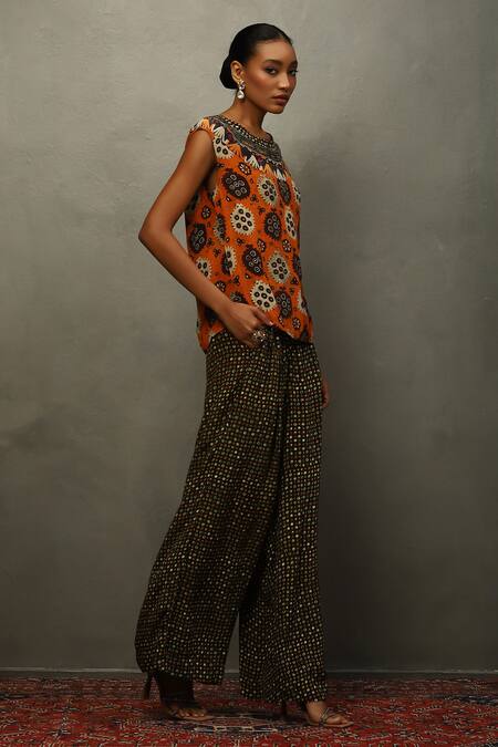 RI.Ritu Kumar Black Viscose Mirrors, Embroidery Tribal Bloom Print Cape And Flared Pant Set at Aza Fashions RI.Ritu Kumar_Black Viscose Mirrors, Embroidery Tribal Bloom Print Cape And Flared Pant Set _at_Aza_Fashions