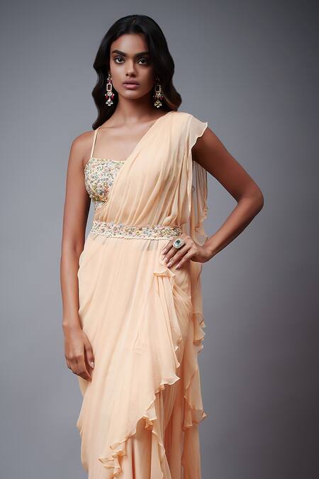 RI.Ritu Kumar Peach Viscose Sequins, Zari, Embroidery Sweetheart Neck Floral Ruffle Saree Set Online at Aza Fashions RI.Ritu Kumar_Peach Viscose Sequins, Zari, Embroidery Sweetheart Neck Floral Ruffle Saree Set _Online_at_Aza_Fashions