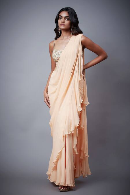 Shop RI.Ritu Kumar Peach Viscose Sequins, Zari, Embroidery Sweetheart Neck Floral Ruffle Saree Set Online at Aza Fashions Shop_RI.Ritu Kumar_Peach Viscose Sequins, Zari, Embroidery Sweetheart Neck Floral Ruffle Saree Set _Online_at_Aza_Fashions
