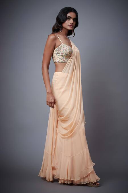 RI.Ritu Kumar Peach Viscose Sequins, Zari, Embroidery Sweetheart Neck Floral Ruffle Saree Set at Aza Fashions RI.Ritu Kumar_Peach Viscose Sequins, Zari, Embroidery Sweetheart Neck Floral Ruffle Saree Set _at_Aza_Fashions