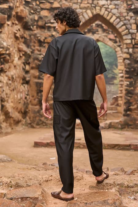 Shop Dash And Dot Black Polyester, Viscose, Spandex Solid Carrot Legged Pant at Aza Fashions Shop_Dash And Dot_Black Polyester, Viscose, Spandex Solid Carrot Legged Pant _at_Aza_Fashions