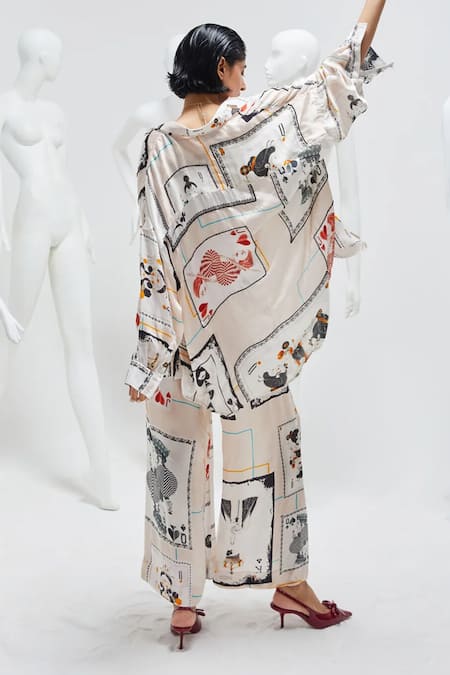 Shop She'll White Satin, Chiffon Lace Collared, Bandeau Neck Card Print Shirt And Pant Set at Aza Fashions Shop_She'll_White Satin, Chiffon Lace Collared, Bandeau Neck Card Print Shirt And Pant Set _at_Aza_Fashions