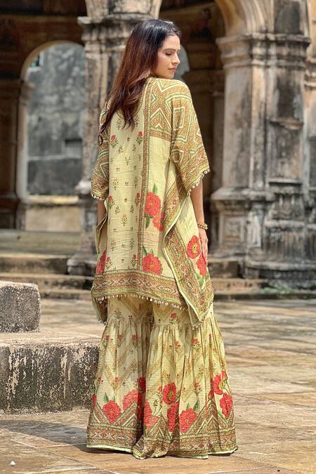 Surkh Syahi_Yellow Crepe Embroidery Round Neck Floral Print Kaftan And Gharara Set_at_Aza_Fashions