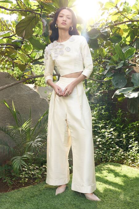 Kay Kay Off White Silk, Rayon Applique, Sequins Round Neck 3d Floral Top And Pant Set at Aza Fashions Kay Kay_Off White Silk, Rayon Applique, Sequins Round Neck 3d Floral Top And Pant Set _at_Aza_Fashions