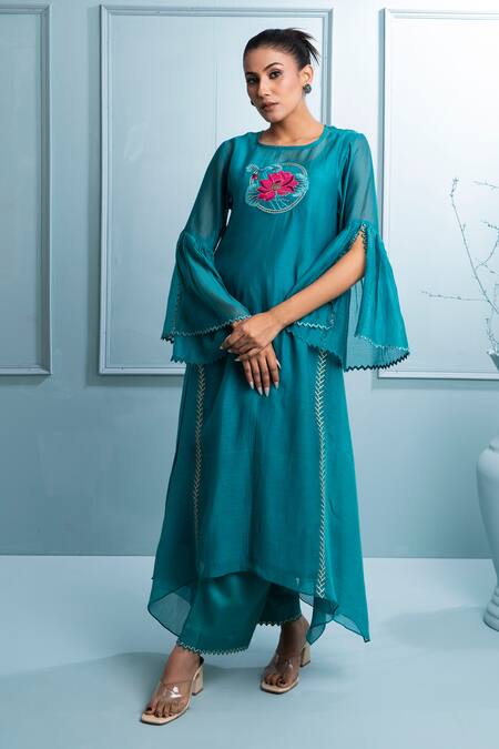 The White Tree Studio_Blue Chanderi, Cotton Embroidery Round Neck Teal Floral Kurta Set _at_Aza_Fashions
