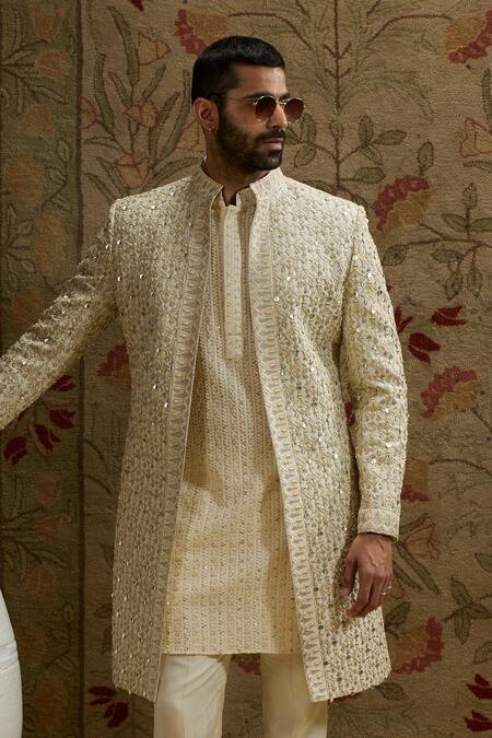 Sva By Sonam & Paras Modi Ivory Silk Sequins Jaal Embroidered Sherwani at Aza Fashions Sva By Sonam & Paras Modi_Ivory Silk Sequins Jaal Embroidered Sherwani_at_Aza_Fashions