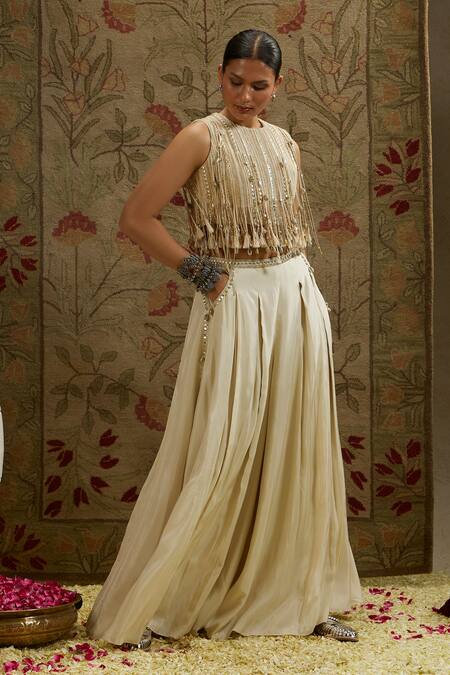 Sva By Sonam & Paras Modi_Ivory Silk Beads, Tassels Round Neck Embellished Crop Top And Flared Pant_Online_at_Aza_Fashions