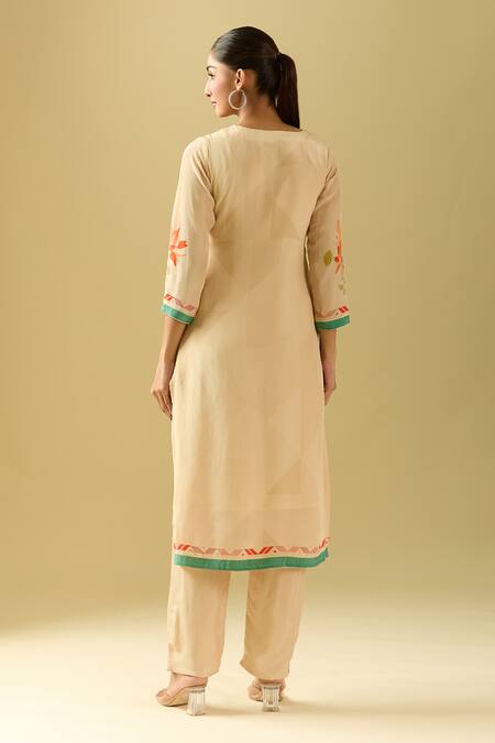 Shop Samyukta Singhania Cream Crepe, Silk Cut Work, Beads V-neck Embroidered Flower Bloom Kurta Set at Aza Fashions Shop_Samyukta Singhania_Cream Crepe, Silk Cut Work, Beads V-neck Embroidered Flower Bloom Kurta Set_at_Aza_Fashions