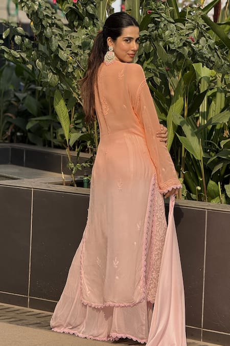 Shop LABEL AISHWARYRIKA Orange Georgette Embroidery Split V-neck Floral Chikankari Kurta Palazzo Set at Aza Fashions Shop_LABEL AISHWARYRIKA_Orange Georgette Embroidery Split V-neck Floral Chikankari Kurta Palazzo Set _at_Aza_Fashions