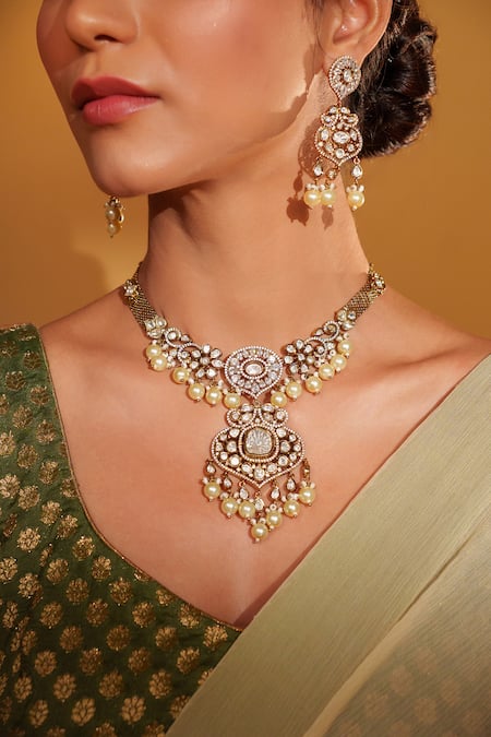 Buy Zevar By Geeta Gold Plated Pearls, Piping Floral Cutwork Kundan Necklace Set Online at Aza Fashions Buy_Zevar By Geeta_Gold Plated Pearls, Piping Floral Cutwork Kundan Necklace Set _Online_at_Aza_Fashions