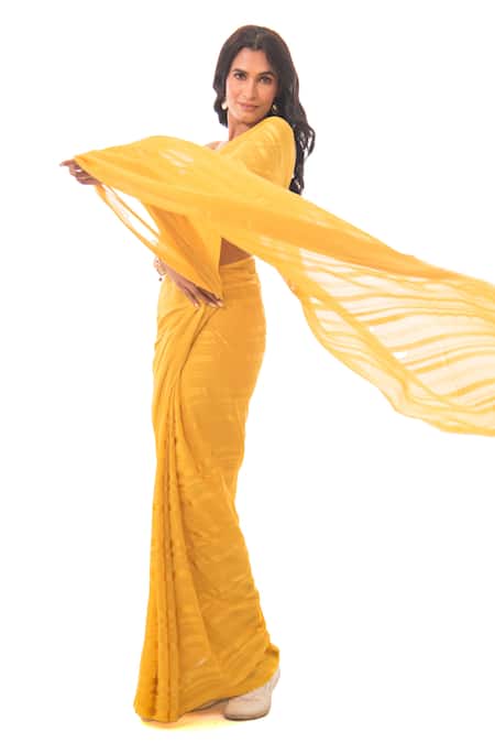 Shop Sacred Weaves Yellow Georgette Tassels Mustard Tonal Stripe Saree at Aza Fashions Shop_Sacred Weaves_Yellow Georgette Tassels Mustard Tonal Stripe Saree_at_Aza_Fashions