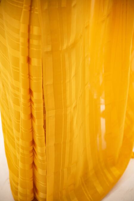 Buy Sacred Weaves Yellow Georgette Tassels Mustard Tonal Stripe Saree Buy_Sacred Weaves_Yellow Georgette Tassels Mustard Tonal Stripe Saree