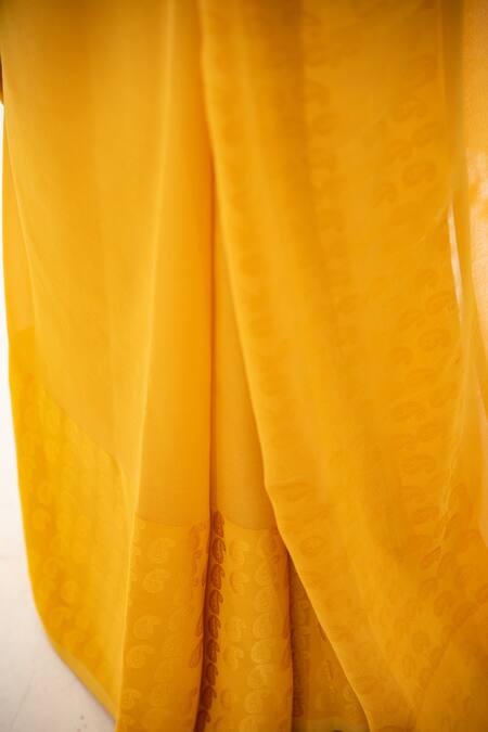 Buy_Sacred Weaves_Yellow Georgette Tassels Paisley Pattern Saree_Online_at_Aza_Fashions