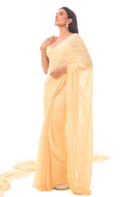 Shop Sacred Weaves Yellow Georgette Tassels Asymmetric Stripe Saree at Aza Fashions Shop_Sacred Weaves_Yellow Georgette Tassels Asymmetric Stripe Saree_at_Aza_Fashions