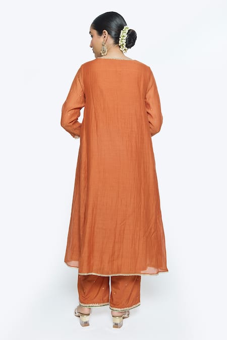 Shop Sinjhar Orange Chanderi, Cotton, Tissue Embroidery Split Floral Hand Kurta Pant Set at Aza Fashions Shop_Sinjhar_Orange Chanderi, Cotton, Tissue Embroidery Split Floral Hand Kurta Pant Set _at_Aza_Fashions