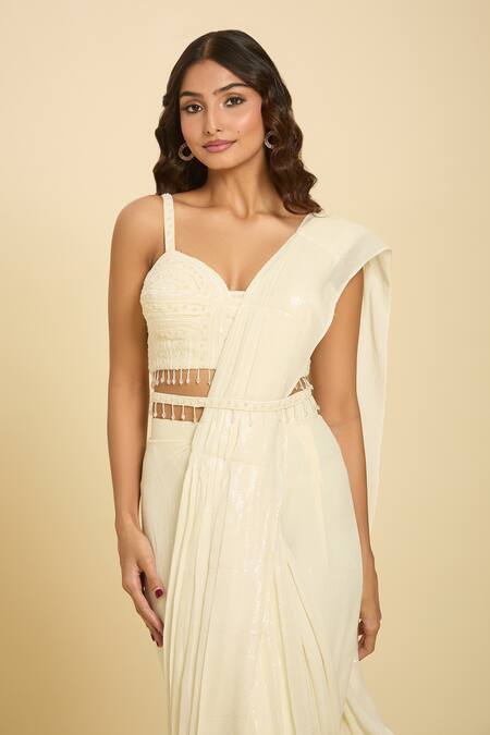 Buy_Samyukta Singhania_Ivory Sequin, Tassel, Bead Sweetheart Embroidered Pre-draped Saree With Blouse_Online_at_Aza_Fashions