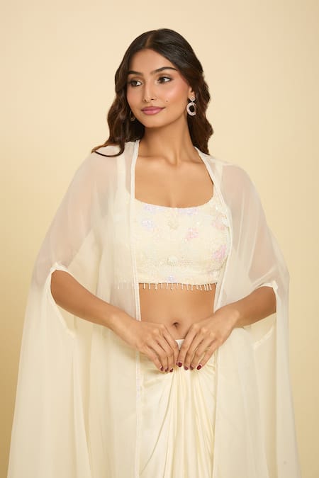 Samyukta Singhania Ivory Chiffon Sequins, Beads, Tassels, Cut Embroidered Waist Draped Skirt Set Online at Aza Fashions Samyukta Singhania_Ivory Chiffon Sequins, Beads, Tassels, Cut Embroidered Waist Draped Skirt Set _Online_at_Aza_Fashions