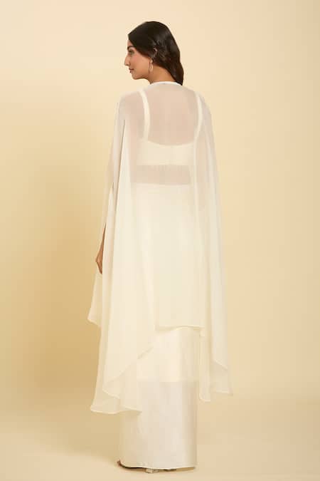 Shop Samyukta Singhania Ivory Chiffon Sequins, Beads, Tassels, Cut Embroidered Waist Draped Skirt Set at Aza Fashions Shop_Samyukta Singhania_Ivory Chiffon Sequins, Beads, Tassels, Cut Embroidered Waist Draped Skirt Set _at_Aza_Fashions