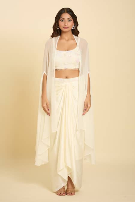 Samyukta Singhania Ivory Chiffon Sequins, Beads, Tassels, Cut Embroidered Waist Draped Skirt Set at Aza Fashions Samyukta Singhania_Ivory Chiffon Sequins, Beads, Tassels, Cut Embroidered Waist Draped Skirt Set _at_Aza_Fashions