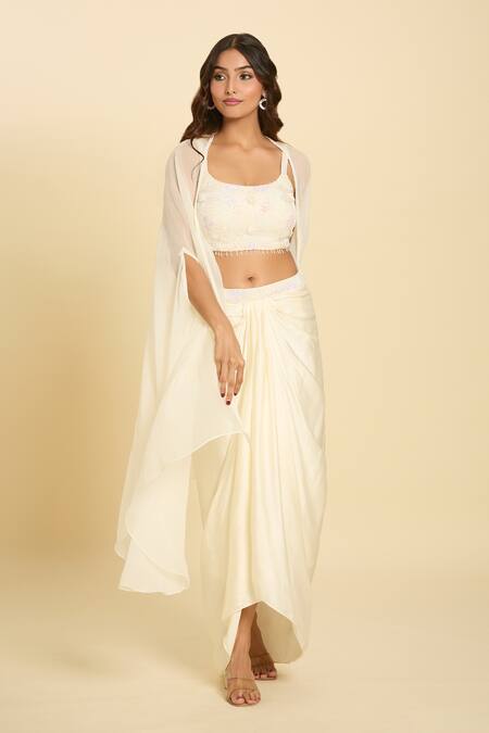 Buy Samyukta Singhania Ivory Chiffon Sequins, Beads, Tassels, Cut Embroidered Waist Draped Skirt Set Buy_Samyukta Singhania_Ivory Chiffon Sequins, Beads, Tassels, Cut Embroidered Waist Draped Skirt Set