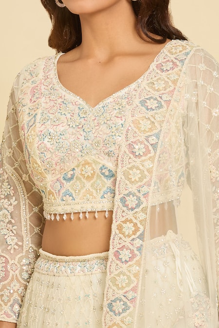 Shop_Azeera_Ivory Chiffon Sequins, Beads Asymmetric Peacock Motif Embroidered Lehenga Set_Online_at_Aza_Fashions