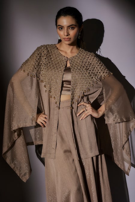 Ajiesh Oberoi Brown Satin, Lurex Beads, Crystals, Embroidery Round Neck Cape Sharara Set at Aza Fashions Ajiesh Oberoi_Brown Satin, Lurex Beads, Crystals, Embroidery Round Neck Cape Sharara Set _at_Aza_Fashions