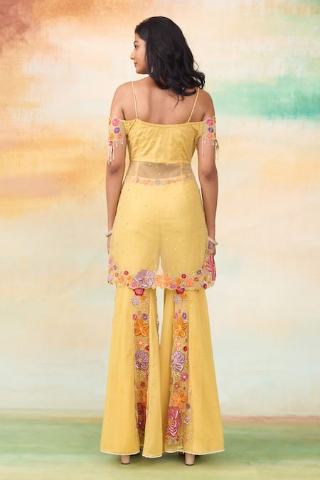 Shop SHASHA GABA Yellow Net, Lace Pearls, Crystals Bloom Embroidered Peplum Kurta Gharara Set at Aza Fashions Shop_SHASHA GABA_Yellow Net, Lace Pearls, Crystals Bloom Embroidered Peplum Kurta Gharara Set _at_Aza_Fashions