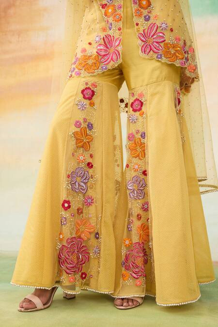 Shop SHASHA GABA Yellow Net, Lace Pearls, Crystals Bloom Embroidered Peplum Kurta Gharara Set Online at Aza Fashions Shop_SHASHA GABA_Yellow Net, Lace Pearls, Crystals Bloom Embroidered Peplum Kurta Gharara Set _Online_at_Aza_Fashions