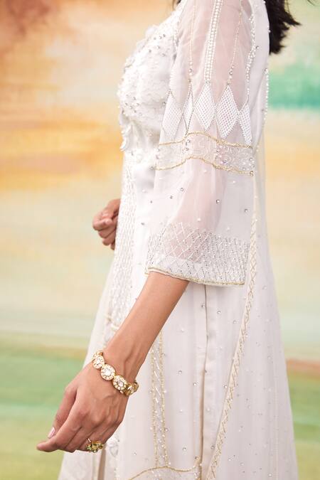Buy SHASHA GABA Ivory Organza, Net Cut Work, Sequins, Bloom Patchwork Kurta Palazzo Set Online at Aza Fashions Buy_SHASHA GABA_Ivory Organza, Net Cut Work, Sequins, Bloom Patchwork Kurta Palazzo Set _Online_at_Aza_Fashions