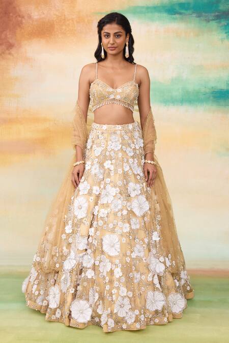 Shop SHASHA GABA Gold Muslin Pearls, Crystals, Stones, Embroidery, 3d Bloom Patchwork Lehenga Set Online at Aza Fashions Shop_SHASHA GABA_Gold Muslin Pearls, Crystals, Stones, Embroidery, 3d Bloom Patchwork Lehenga Set _Online_at_Aza_Fashions