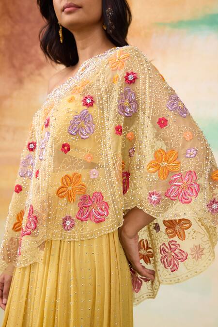 SHASHA GABA Yellow Organza, Muslin Embroidery One Shoulder Cape Top And Skirt Set at Aza Fashions SHASHA GABA_Yellow Organza, Muslin Embroidery One Shoulder Cape Top And Skirt Set _at_Aza_Fashions