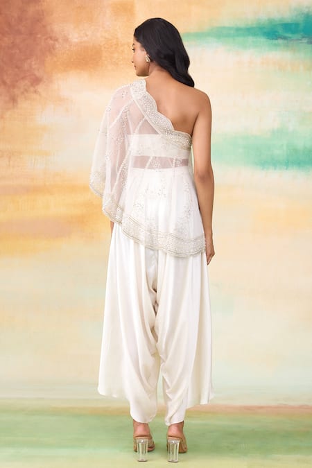Shop SHASHA GABA Ivory Organza, Modal Cut Work Round Neck Ditsy Embroidered One Shoulder Cape Set at Aza Fashions Shop_SHASHA GABA_Ivory Organza, Modal Cut Work Round Neck Ditsy Embroidered One Shoulder Cape Set _at_Aza_Fashions