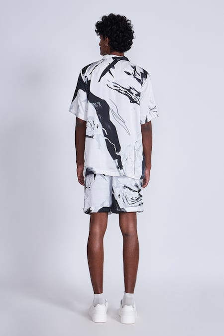 Shop_Advait_Black Satin And White Paint Splash Print Shorts _at_Aza_Fashions