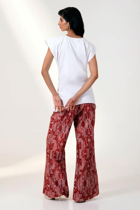 Shop Madder Much White Chanderi Silk, Poplin Bows, Tassels Detail Top And Red Printed Pant Set at Aza Fashions Shop_Madder Much_White Chanderi Silk, Poplin Bows, Tassels Detail Top And Red Printed Pant Set _at_Aza_Fashions