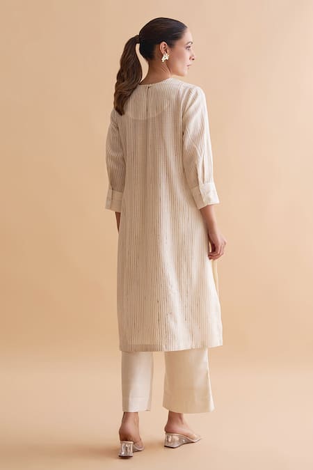 Shop_Vaaya_Ivory Tussar Round Neck Striped Yoke Tunic And Pant Set _at_Aza_Fashions