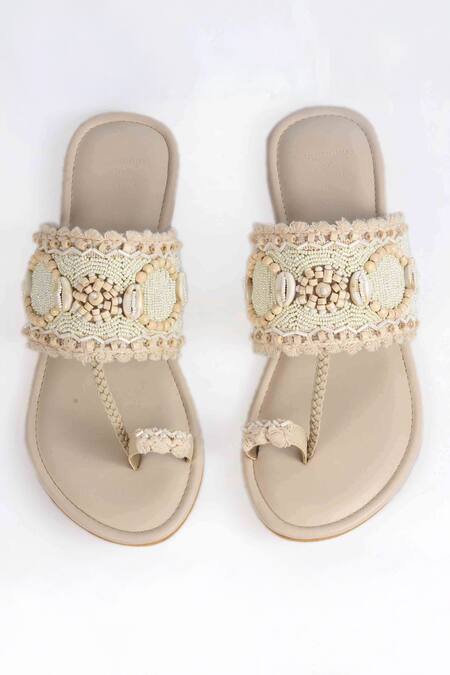 Buy Irasoles Brown Beads, Pearls, Tassels Embroidered Kolhapuri Flats Buy_Irasoles_Brown Beads, Pearls, Tassels Embroidered Kolhapuri Flats