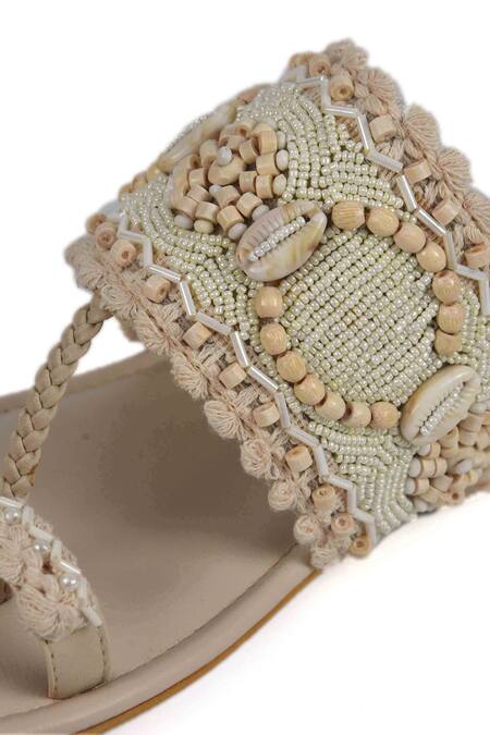 Shop Irasoles Brown Beads, Pearls, Tassels Embroidered Kolhapuri Flats Shop_Irasoles_Brown Beads, Pearls, Tassels Embroidered Kolhapuri Flats