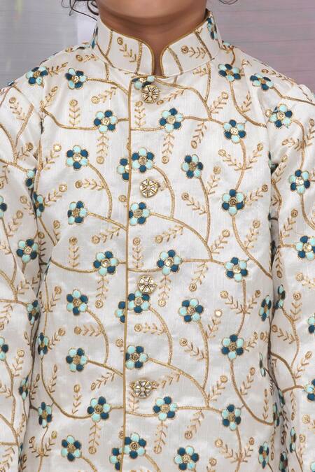 Little Bansi Cream Silk, Cotton Embroidery Floral Woven Sherwani And Dhoti Pant at Aza Fashions Little Bansi_Cream Silk, Cotton Embroidery Floral Woven Sherwani And Dhoti Pant _at_Aza_Fashions
