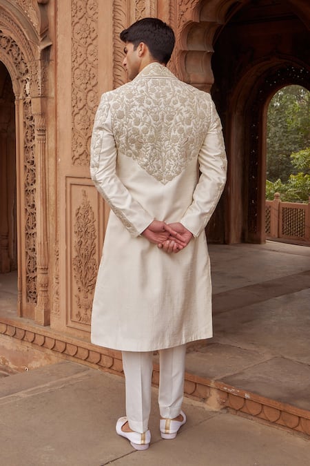 Shop Nidhika Shekhar Ivory Silk, , Satin Embroidery Floral Sherwani Set at Aza Fashions Shop_Nidhika Shekhar_Ivory Silk, , Satin Embroidery Floral Sherwani Set _at_Aza_Fashions