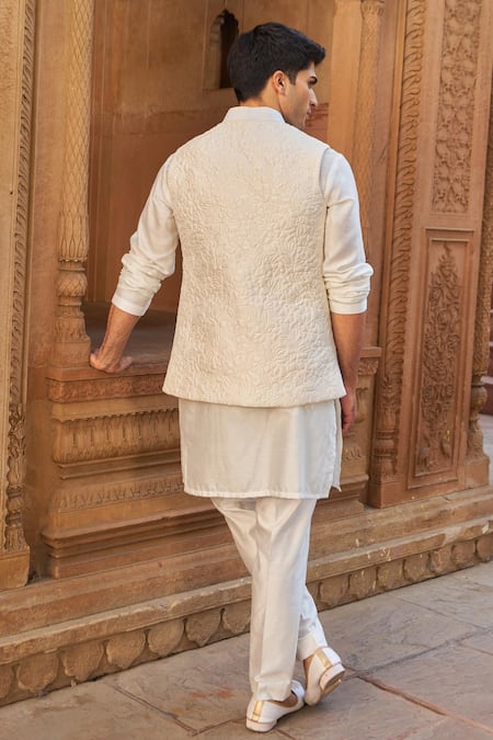 Shop Nidhika Shekhar Ivory Silk, Cotton Embroidery Floral Quilted Bundi Kurta Set at Aza Fashions Shop_Nidhika Shekhar_Ivory Silk, Cotton Embroidery Floral Quilted Bundi Kurta Set _at_Aza_Fashions