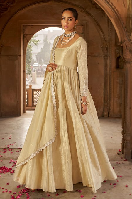 Nidhika Shekhar_Gold Organza, Net, Tissue Sequins, Blossom Embroidered Jacket And Anarkali Set _at_Aza_Fashions