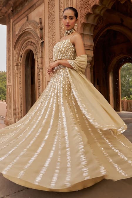 Buy Nidhika Shekhar Gold Organza, Linen Sequins Square Neck Embroidered Lehenga Set Online at Aza Fashions Buy_Nidhika Shekhar_Gold Organza, Linen Sequins Square Neck Embroidered Lehenga Set _Online_at_Aza_Fashions