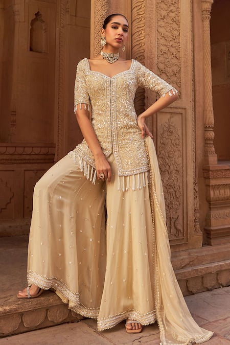 Nidhika Shekhar_Gold Organza, Net Sequins, Pearls, Beads Embroidered Kurta Sharara Set _at_Aza_Fashions