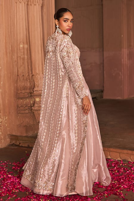 Shop Nidhika Shekhar Pink Net, Silk, Tissue Pearls, Sequins Bloom Embroidered Cape And Lehenga Set Online at Aza Fashions Shop_Nidhika Shekhar_Pink Net, Silk, Tissue Pearls, Sequins Bloom Embroidered Cape And Lehenga Set _Online_at_Aza_Fashions