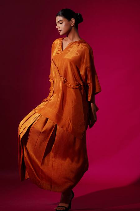 Stoique_Orange Muslin Pleated Mysore Silk Long Skirt _Online_at_Aza_Fashions